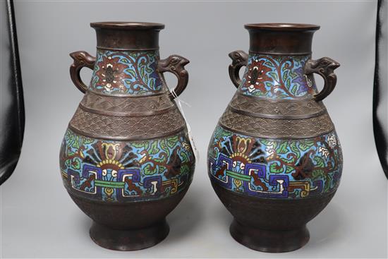 A pair of Japanese champleve enamel vases, height 30cm